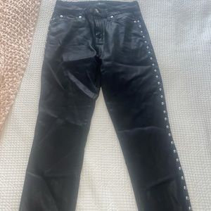 7 for all Mankind shiny leather jeans with silver detailing on both sides.